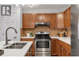 Primary Bedroom - 105 Saddlecrest Green Ne, Calgary, AB T3J5N5 Photo 16