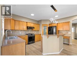 Family room - 264 Willowmere Way, Chestermere, AB T1X0E1 Photo 11