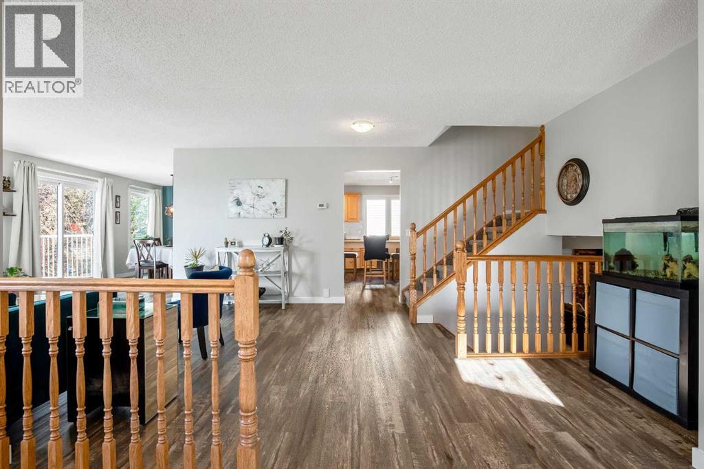 Updated vinyl plank flooring throughout the main living space