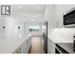 Living room - 9993 Huxbury Drive Ne, Calgary, AB T1X0L4 Photo 12
