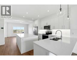 Kitchen - 9993 Huxbury Drive Ne, Calgary, AB T1X0L4 Photo 11