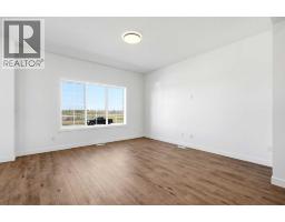 Family room - 9993 Huxbury Drive Ne, Calgary, AB T1X0L4 Photo 7