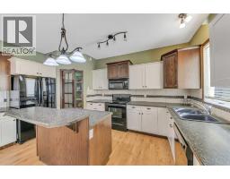 Den - 61 Lanterman Close, Red Deer, AB T4R3N3 Photo 13