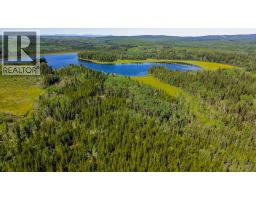 Primary bedroom of 29200 DAHL LAKE ROAD · Prince George, BC
