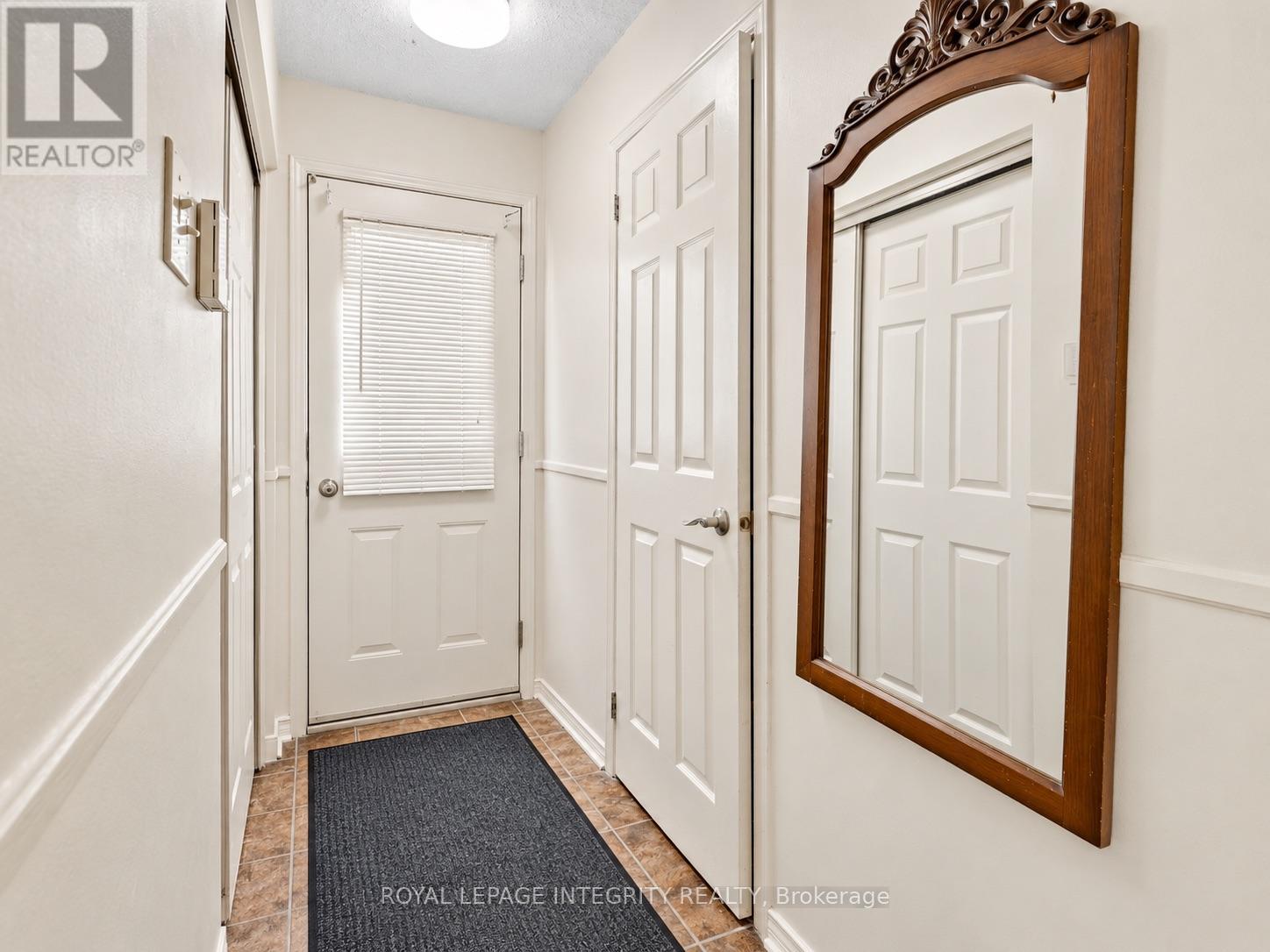 Side entrance with powder room and laundry hook up