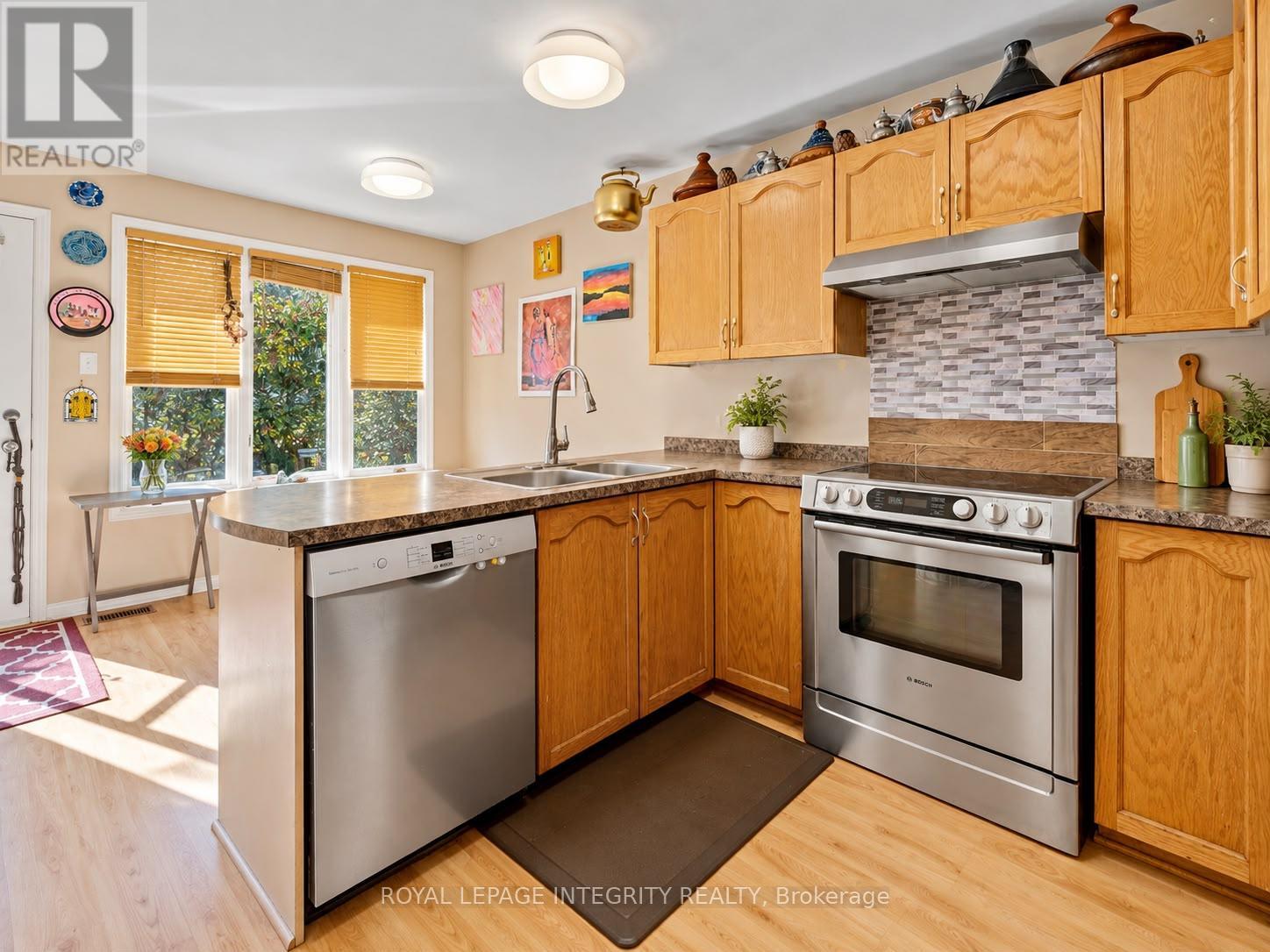 Kitchen with full set of appliances