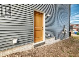 84 Creekside Rise Sw, Calgary, AB T2X6G8 Photo 41