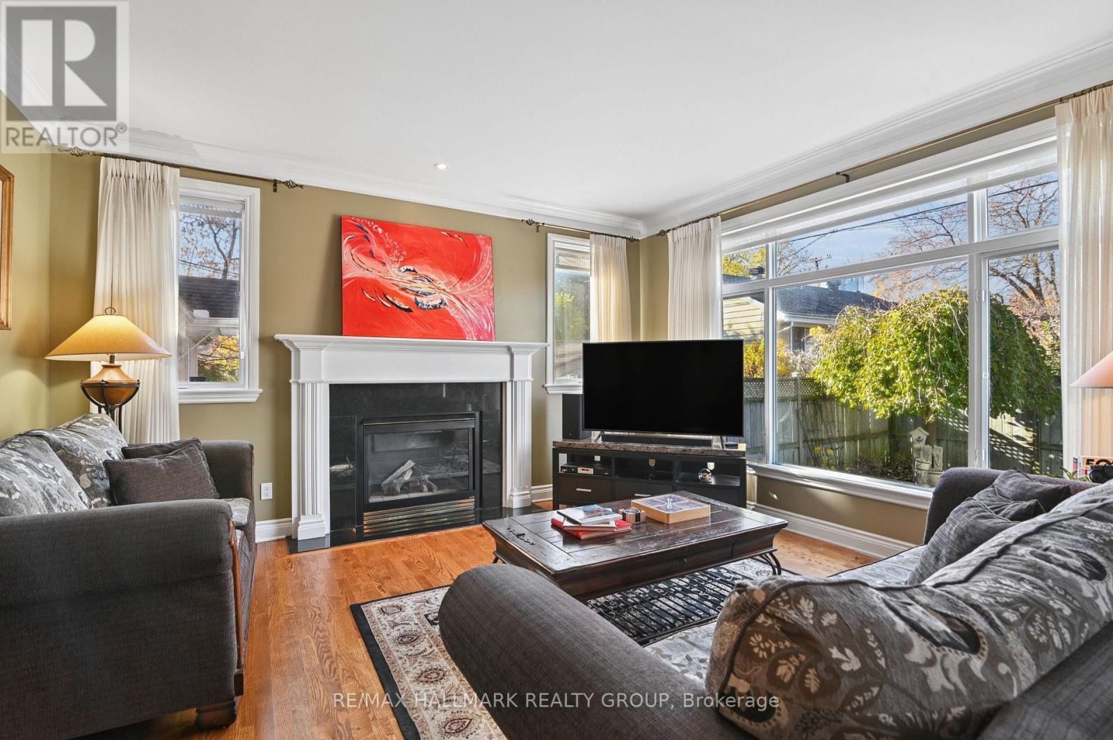 Main floor - Living Room w custom gas fireplace