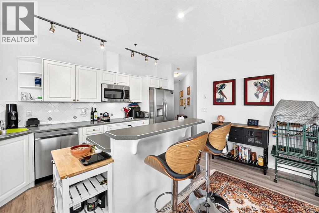 305, 3412 Parkdale Boulevard NW photo 19