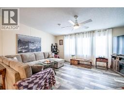 Living room - 501, 37543 England Way, Rural Red Deer County, AB T4S2C3 Photo 8