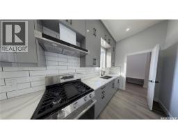 Laundry room - 715 Nazarali Union, Saskatoon, SK S7V1X4 Photo 10
