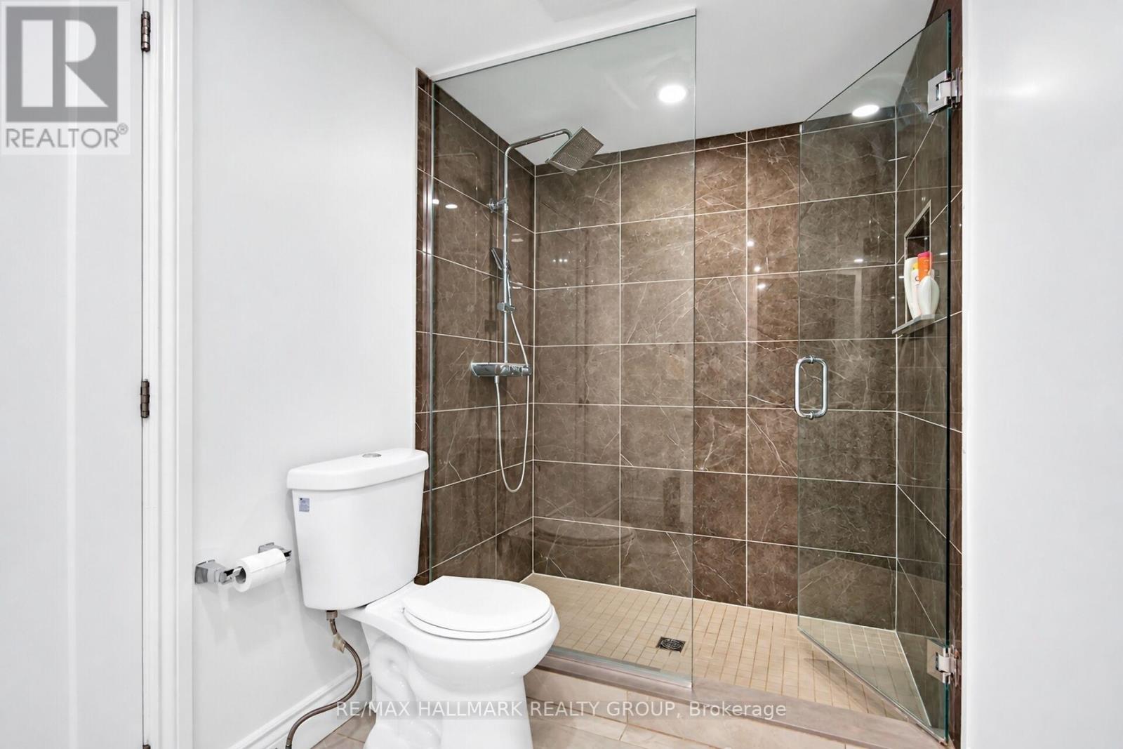 Basement Glass-Enclosed Walk-In Shower