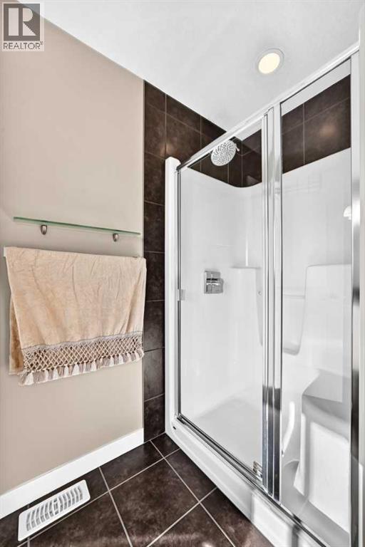 Oversized Shower With A Glass Enclosure