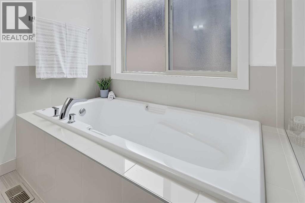 63 Cortina Villas SW, Calgary — photo 22