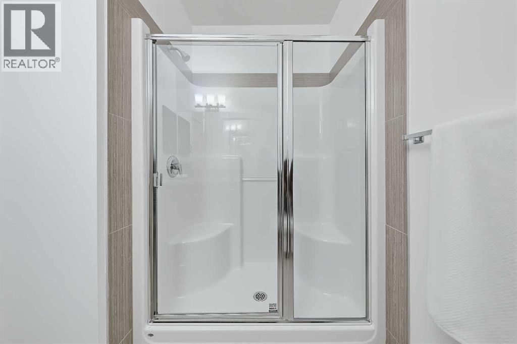 63 Cortina Villas SW, Calgary — photo 34