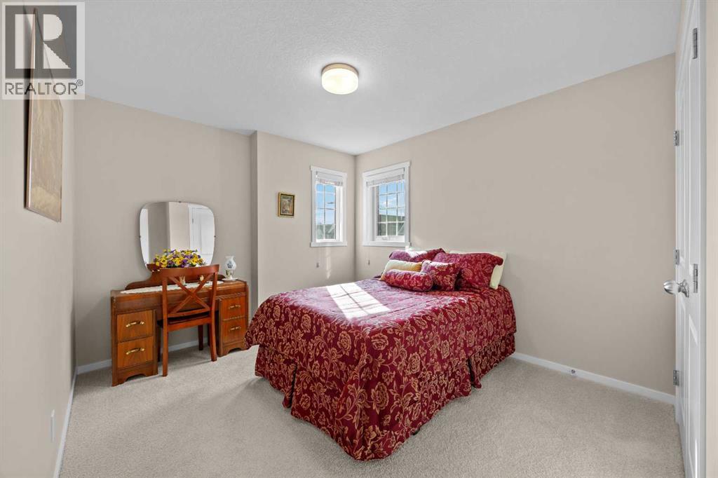 Two additional bedrooms are thoughtfully arranged on the upper floor, close to the primary suite and bonus room