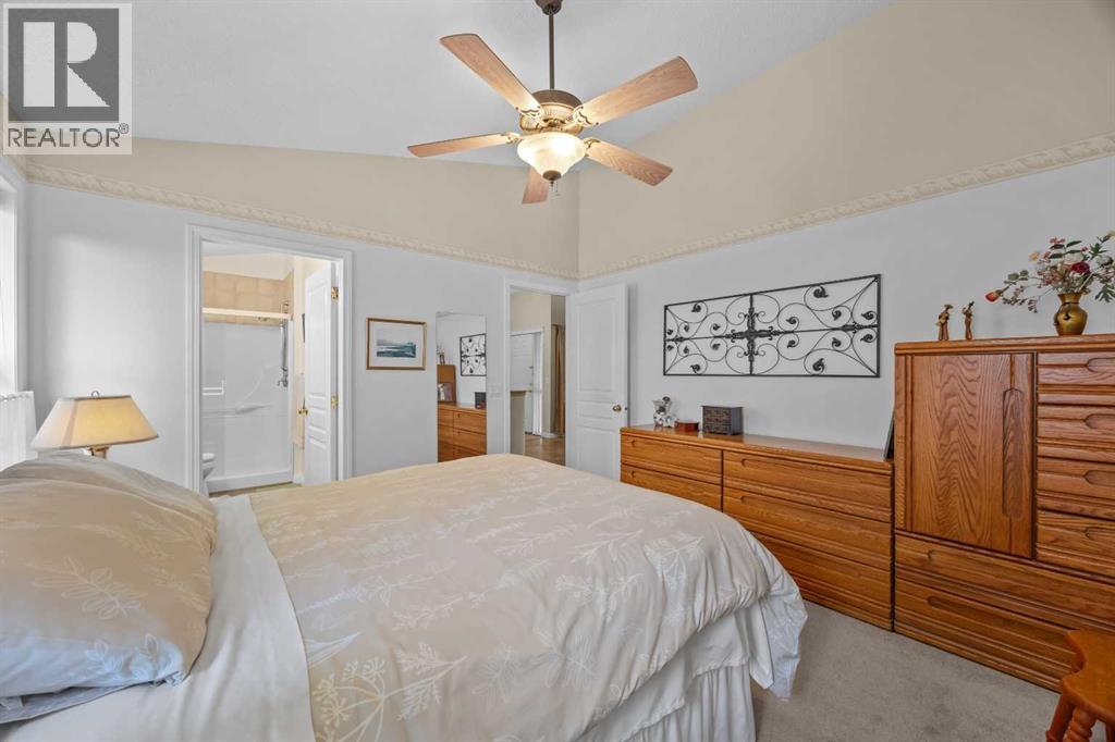At the end of a busy day, retreat to a comfortable primary bedroom with a ceiling fan, and the convenience of your own ensuite and walk-in closet