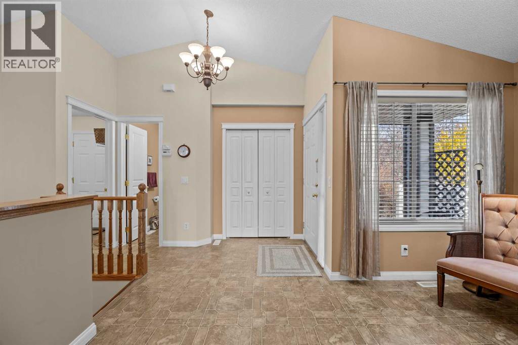 There's a welcoming feeling from the moment you step inside, with vaulted ceilings, a spacious entry, and the ease of having your everyday living spaces all on one level