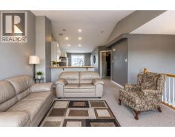 Living room - 20 Taylor Mews Se, Medicine Hat, AB T1B4N4 Photo 10