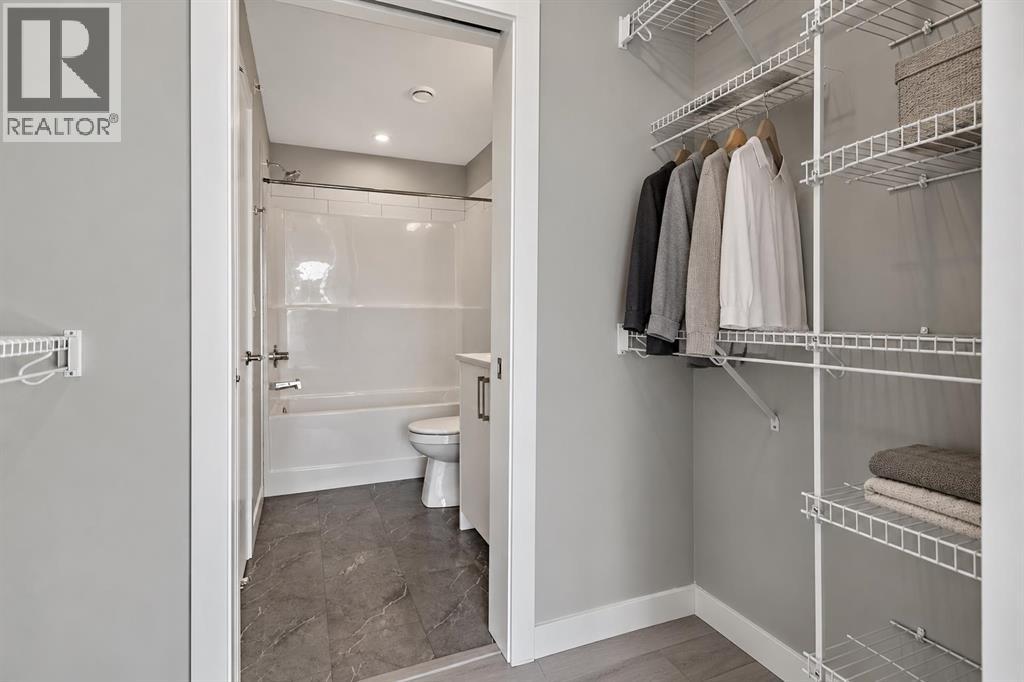 Virtually Staged Photograph - Second Bedroom closet and Jack and Jill bathroom