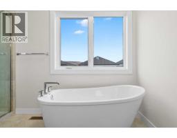 125 Quartz Crescent, Cochrane, AB T4C3G2 Photo 19