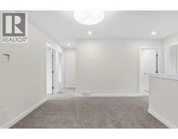 125 Quartz Crescent, Cochrane, AB T4C3G2 Photo 21