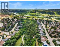 125 Quartz Crescent, Cochrane, AB T4C3G2 Photo 40