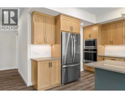 Primary Bedroom - 125 Quartz Crescent, Cochrane, AB T4C3G2 Photo 8