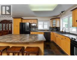 Primary bedroom of 5559 HEYER ROAD · Prince George, BC