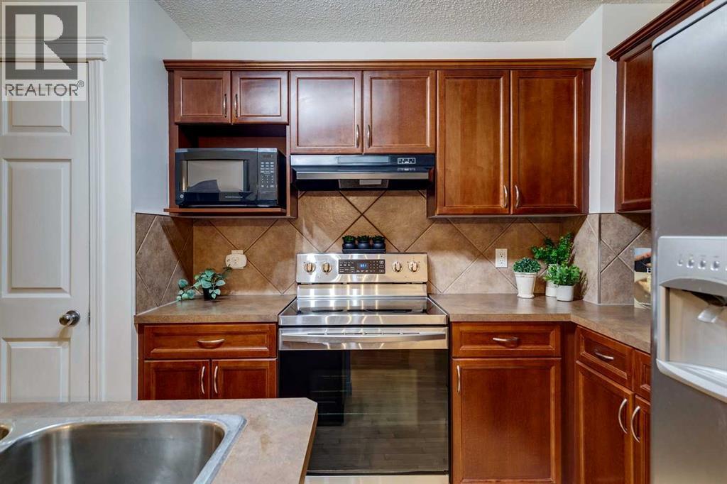 78 Cougar Plateau Way SW, Calgary — photo 9