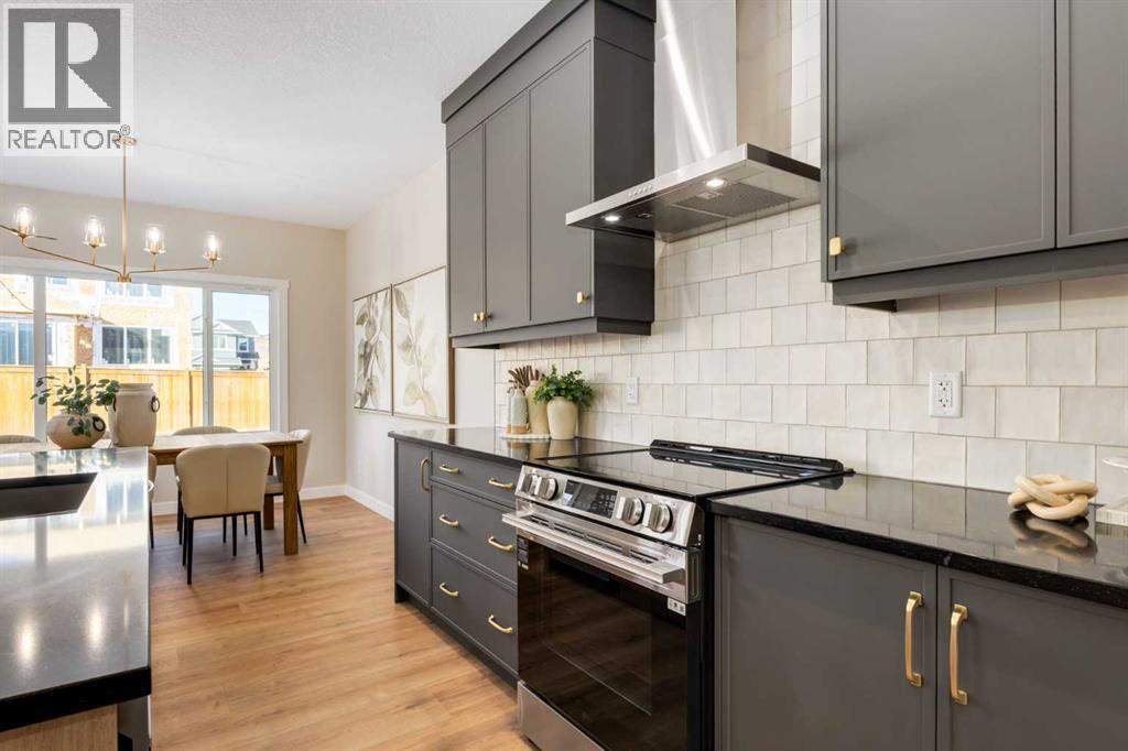 5 Bed, 3 Bath House for Sale in Calgary – 27 Creekside Rise SW, Calgary – MLS# A2338861 - Image 9