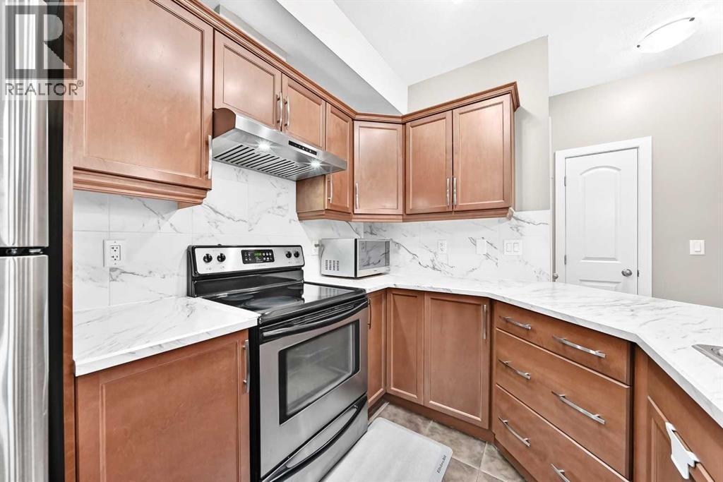 108, 15304 Bannister Road SE, Calgary — photo 11