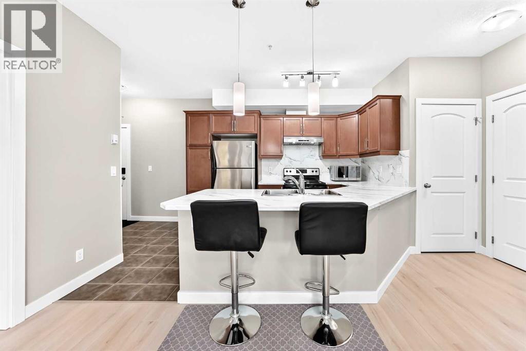 108, 15304 Bannister Road SE, Calgary — photo 5