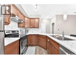 Laundry room - 108, 15304 Bannister Road Se, Calgary, AB T2X0M8 Photo 10