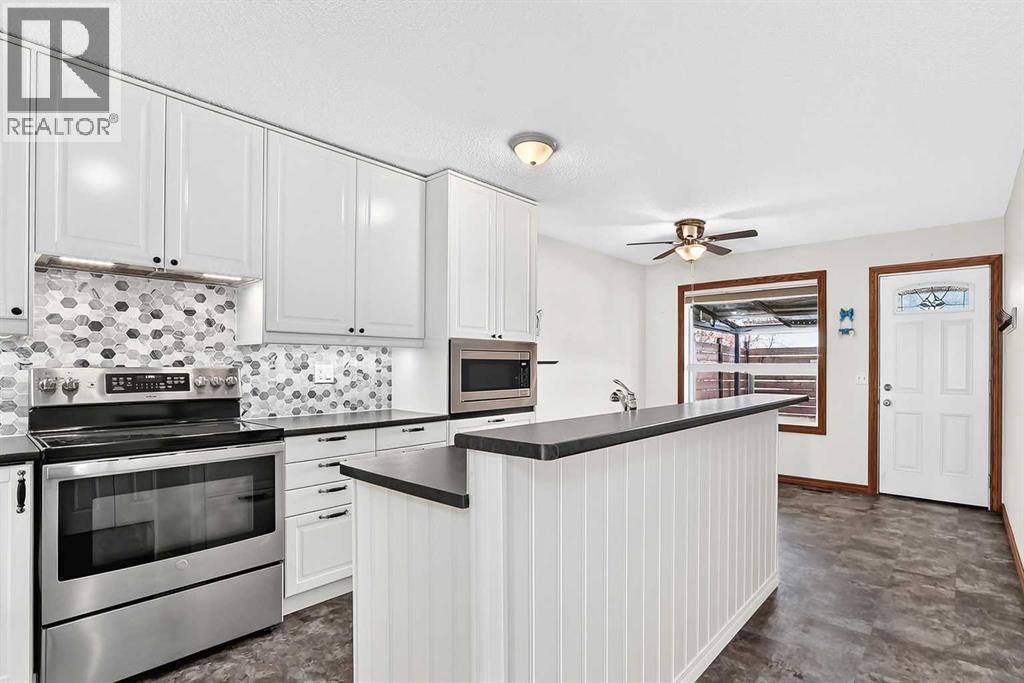 201 Stonegate Drive NW, Airdrie — photo 11