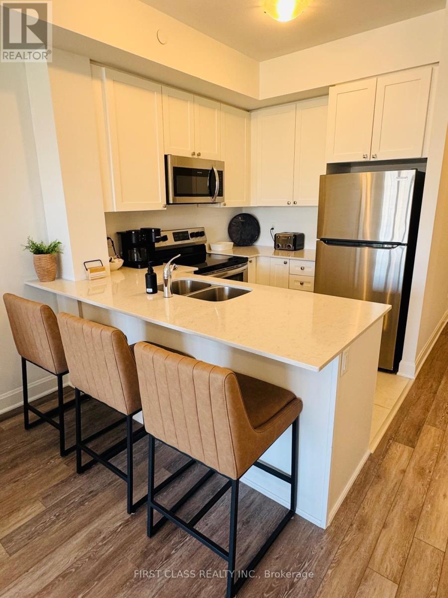 306- 50 Lakebreeze Drive, Clarington, ON photo 8