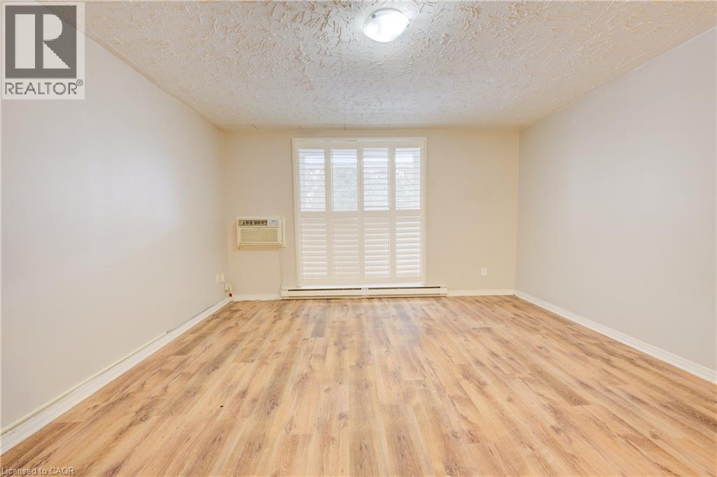 24 MOOREGATE Crescent Unit# 202, Kitchener — photo 12
