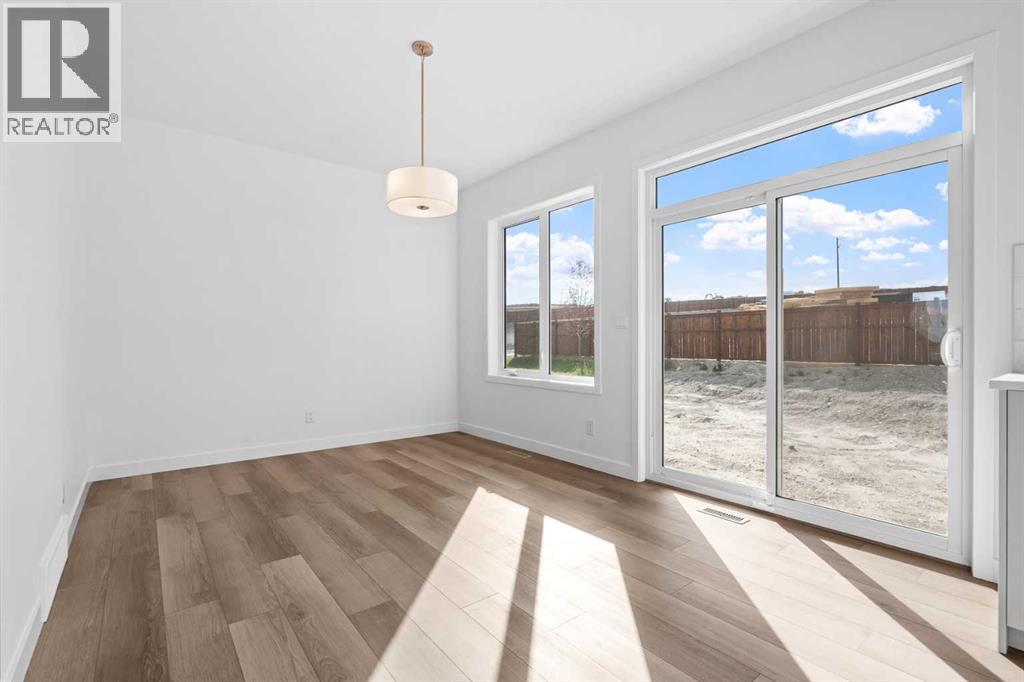 13 Wild Rose Bay SW, photo 6 of 38