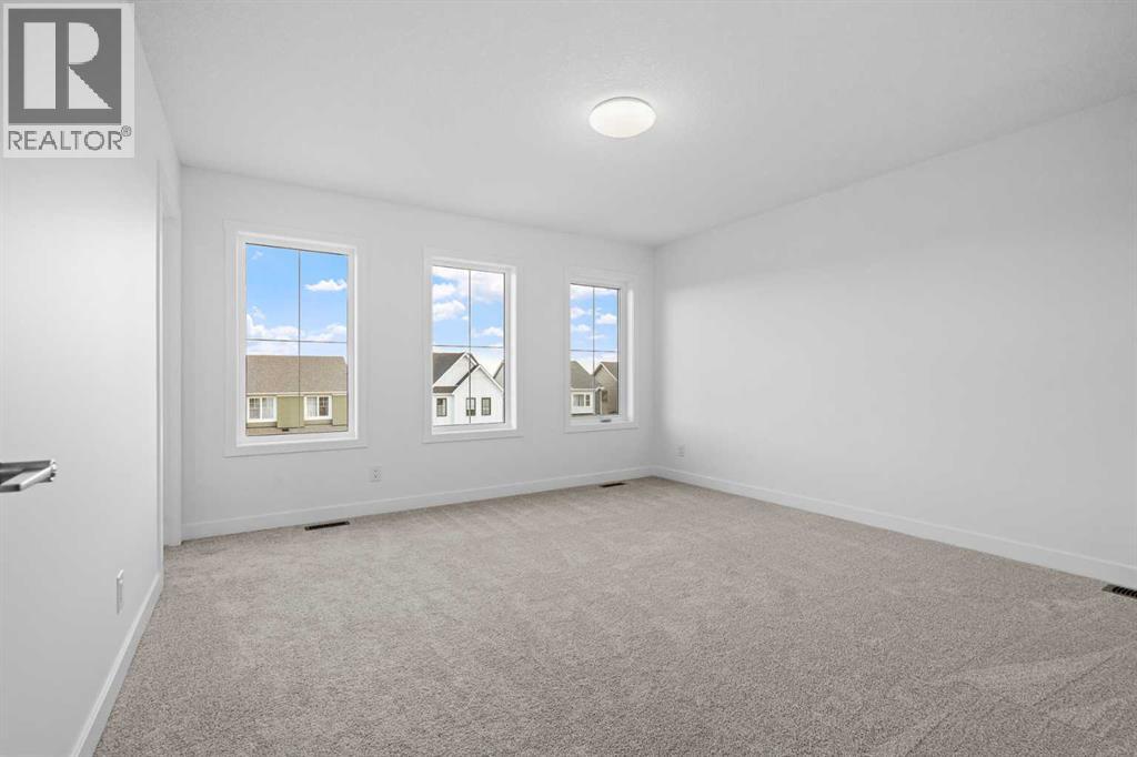 13 Wild Rose Bay SW, photo 15 of 38