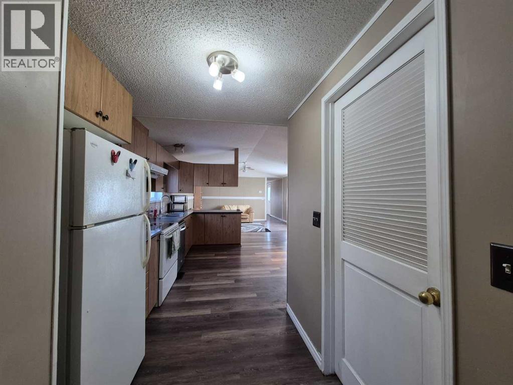 Kitchen with laundry to right