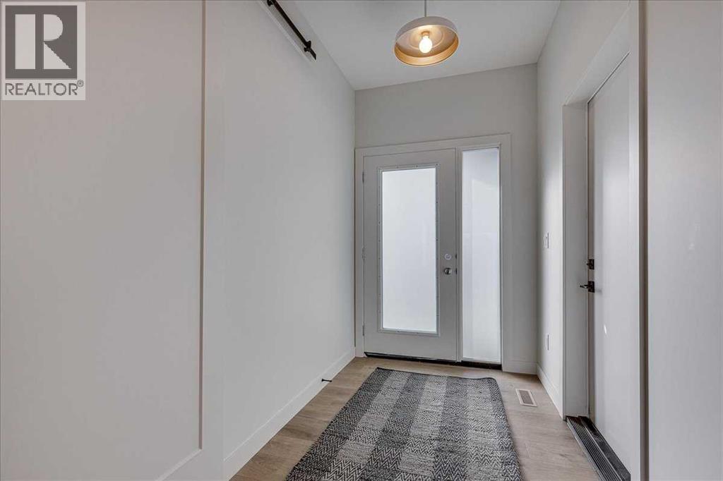 front entry with hidden closet & decorative bench