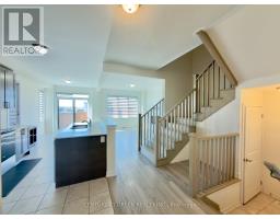 Bedroom 2 - 1546 Rose Way, Milton, ON L9E1V8 Photo 6