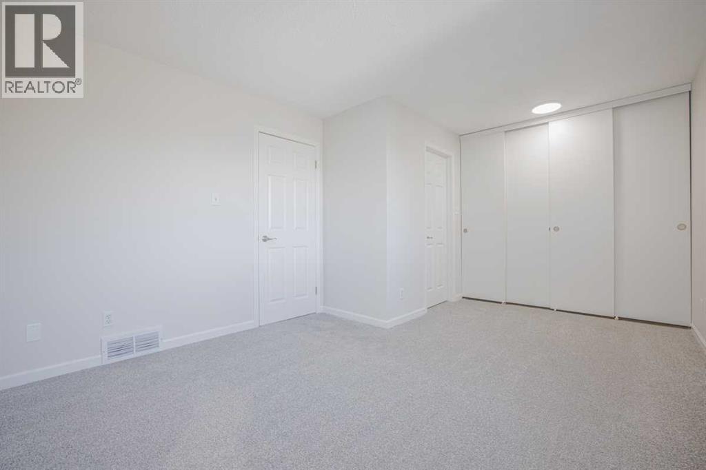 383 Woodfield Road SW, Calgary — photo 20