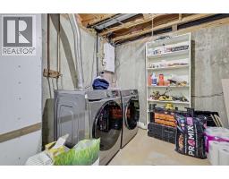 302 Woodvale Crescent Sw, Calgary, AB T2W3P3 Photo 17