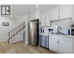 Den - 302 Woodvale Crescent Sw, Calgary, AB T2W3P3 Photo 6