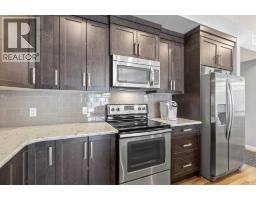 Laundry room - 114, 6703 New Brighton Avenue Se, Calgary, AB T2Z5C8 Photo 6