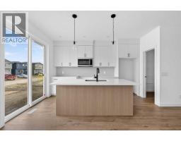 Kitchen - 170 Starling Boulevard Nw, Calgary, AB T3P3E1 Photo 12