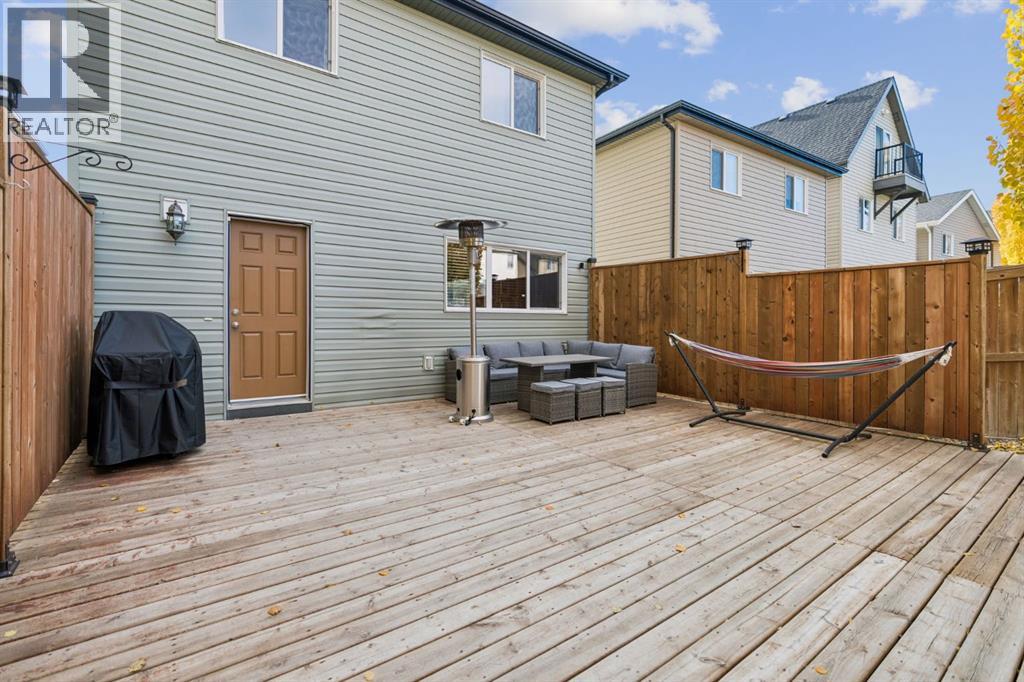 Step outside to a generously sized backyard deck designed for outdoor living, with plenty of space for lounging, dining & entertaining in the privacy of your fully fenced yard