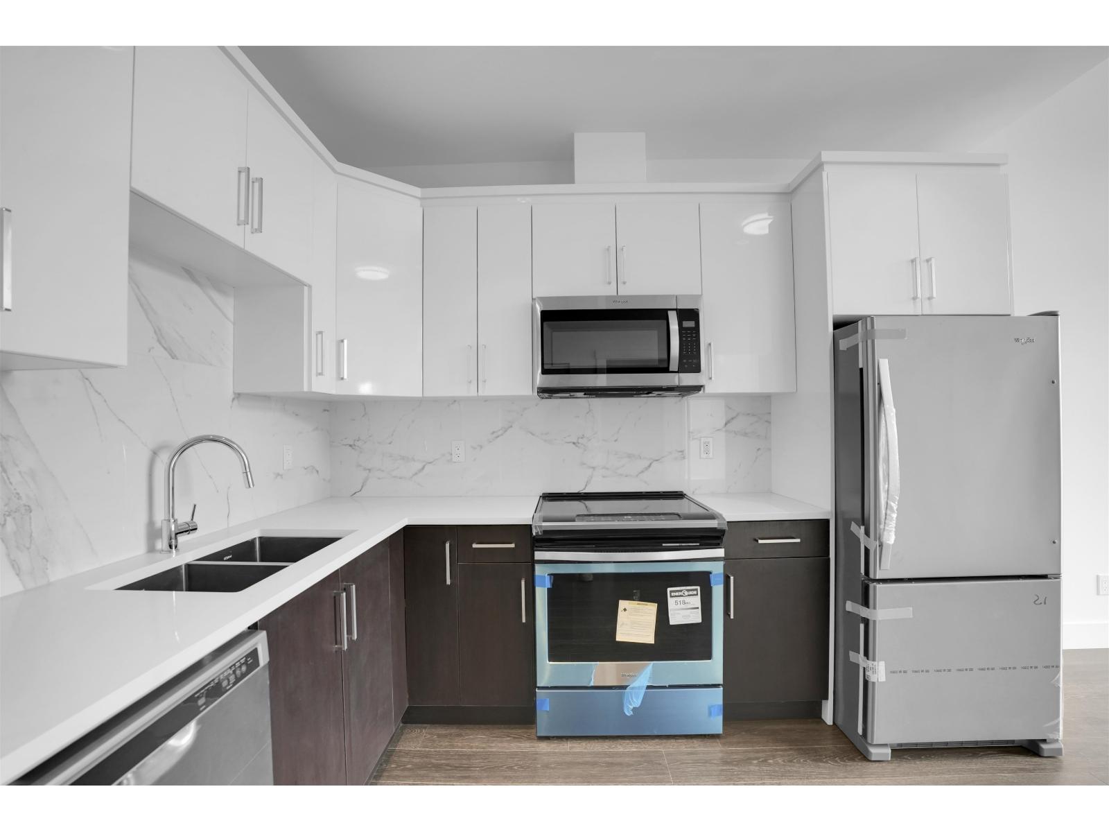 504 9983 E Barnston Drive, Surrey — photo 2