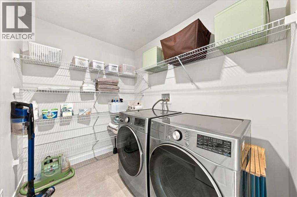 You'll love the convenience of an upper laundry room